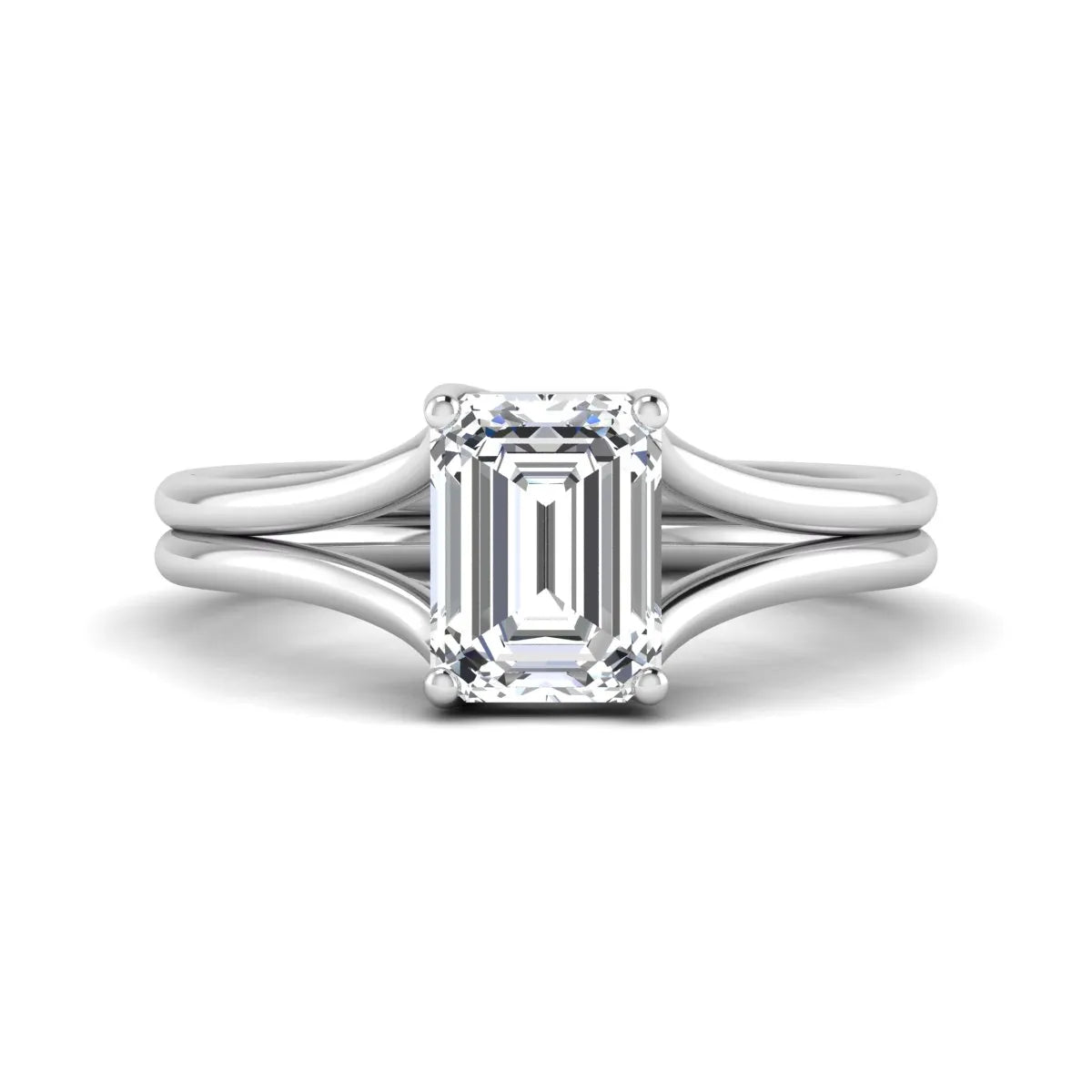 IGI certified 1.75 carat emerald cut lab grown diamond solitaire engagement ring with elegant split shank in white gold.