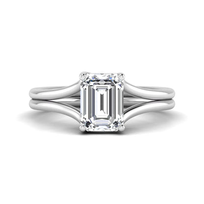 IGI certified 1.75 carat emerald cut lab grown diamond solitaire engagement ring with elegant split shank in white gold.