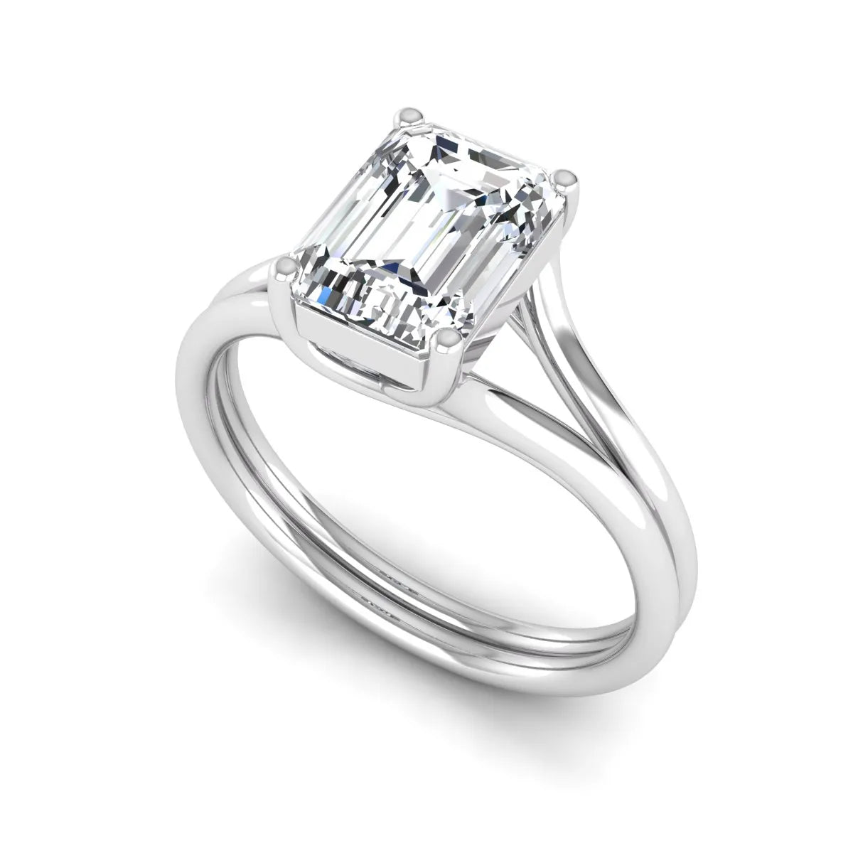 IGI certified 1.75 carat emerald cut lab grown diamond solitaire engagement ring with elegant split shank in white gold.
