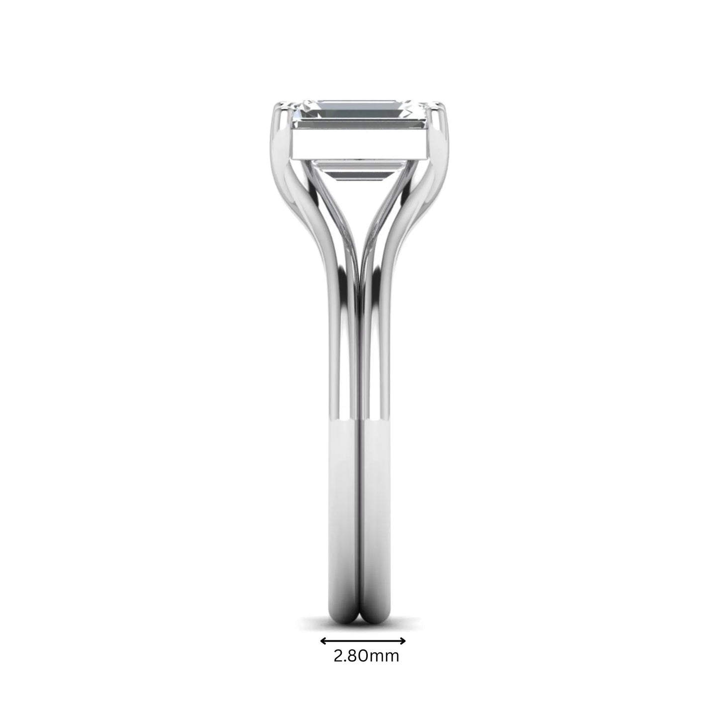 IGI certified 1.75 carat emerald cut lab grown diamond solitaire engagement ring with elegant split shank in white gold.