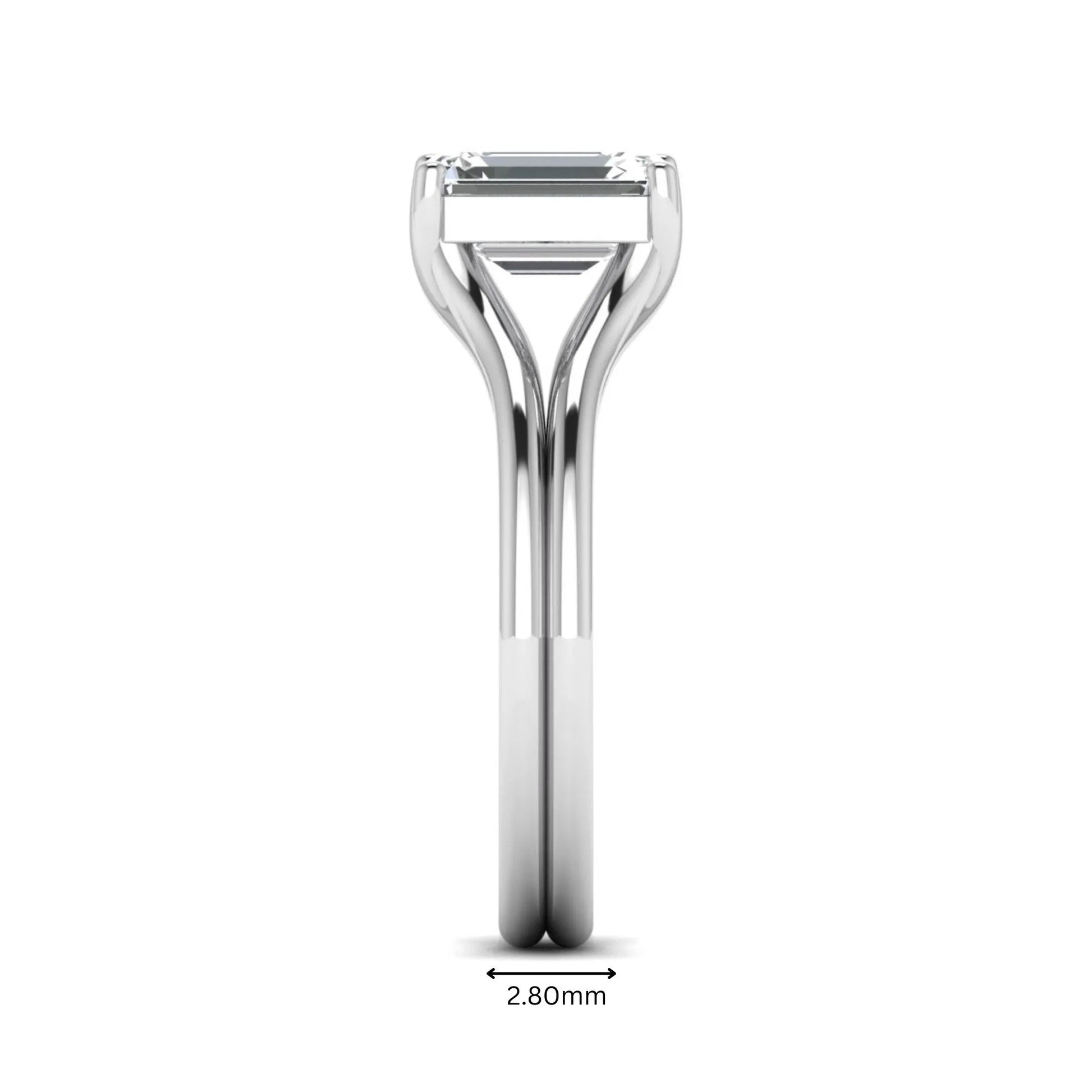 IGI certified 1.75 carat emerald cut lab grown diamond solitaire engagement ring with elegant split shank in white gold.