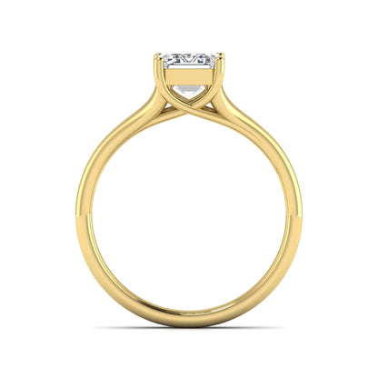 IGI certified 1.75 carat emerald cut lab grown diamond solitaire engagement ring with elegant split shank in yellow gold.
