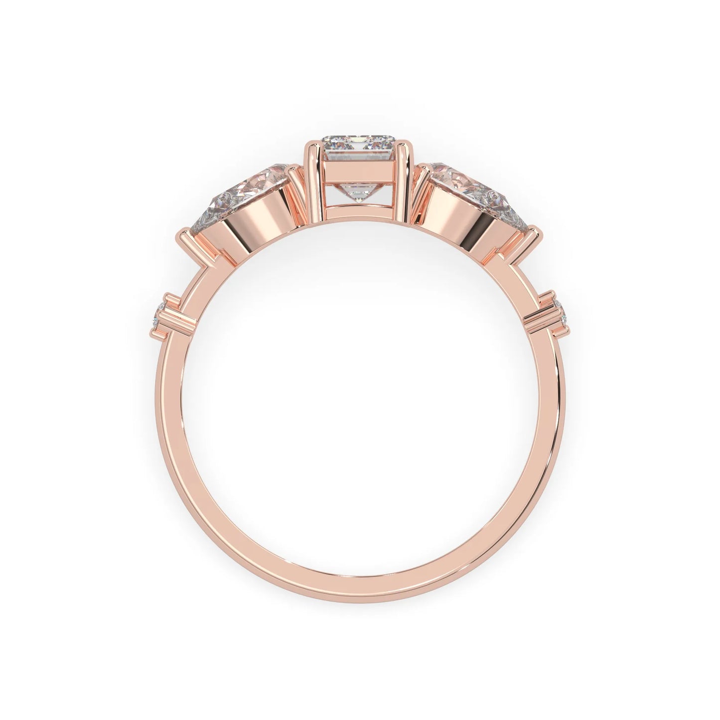 Emerald cut lab grown diamond engagement ring with pear and round diamond three stone design in rose gold