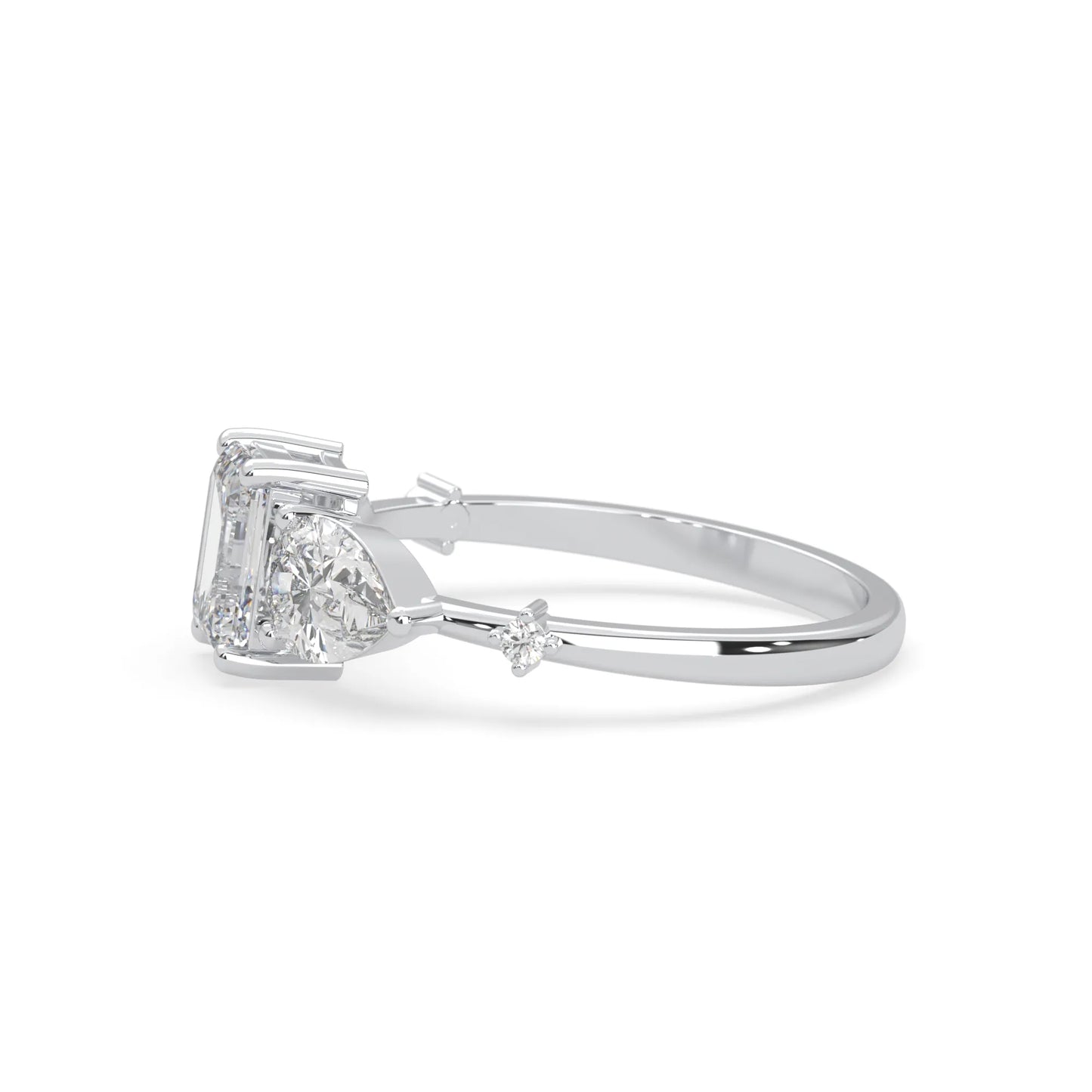 Emerald cut lab grown diamond engagement ring with pear and round diamond three stone design in white gold