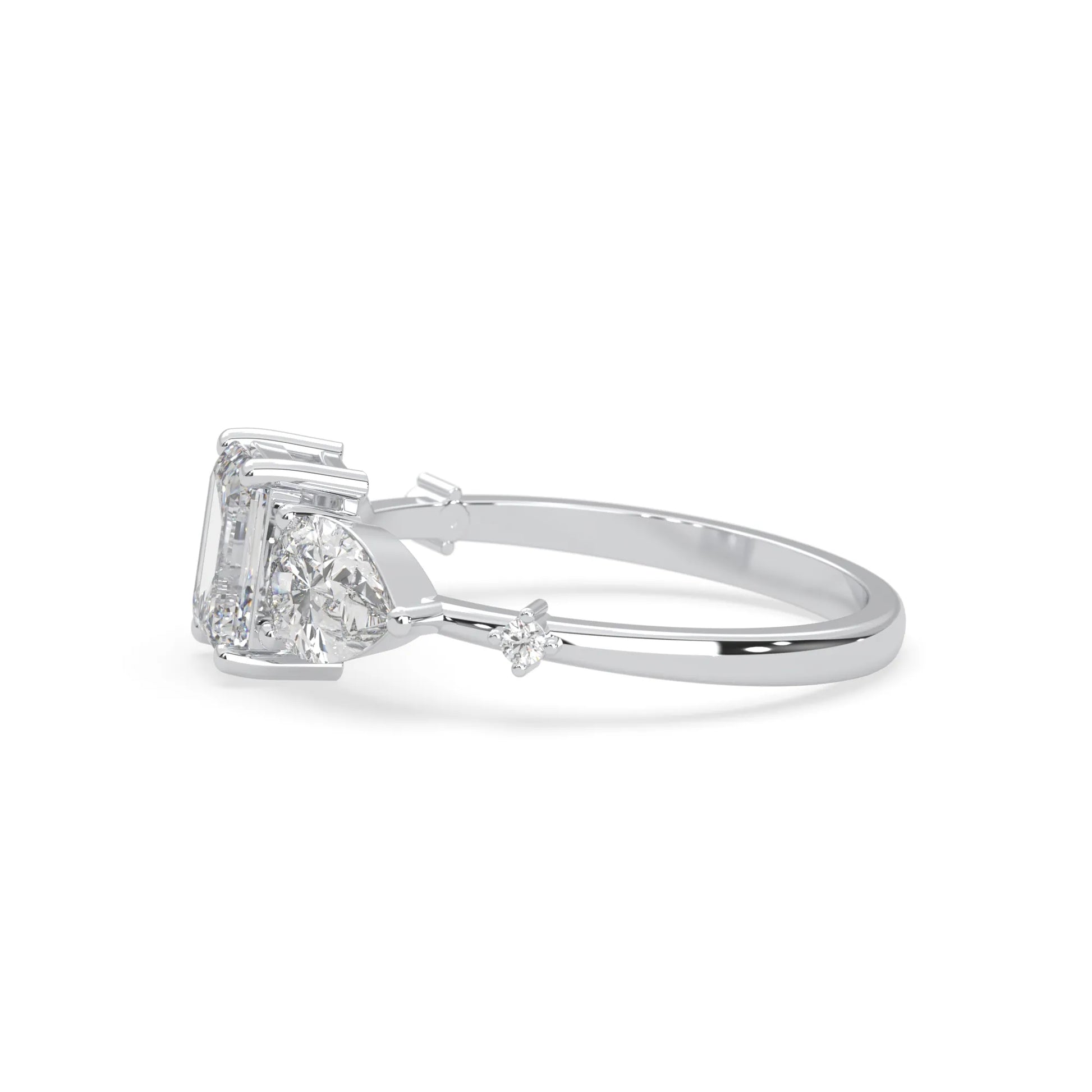 Emerald cut lab grown diamond engagement ring with pear and round diamond three stone design in white gold
