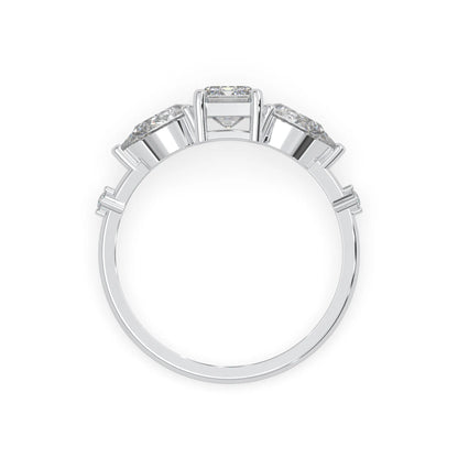 Emerald cut lab grown diamond engagement ring with pear and round diamond three stone design in white gold