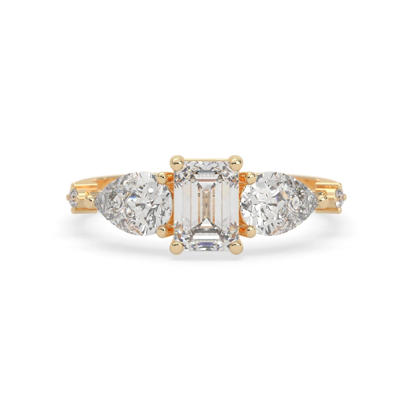 Emerald cut lab grown diamond engagement ring with pear and round diamond three stone design in yellow gold