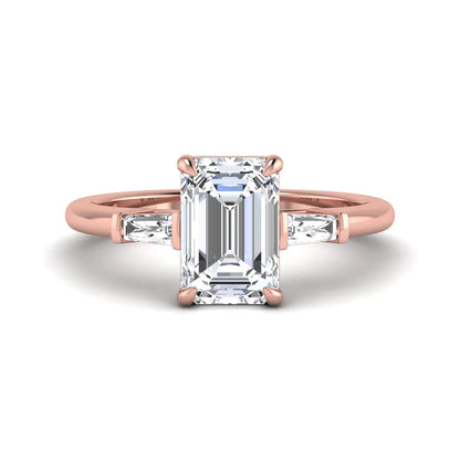 IGI Certified 2.20 carat emerald cut lab grown diamond engagement ring with tapered baguette side diamonds in rose gold.