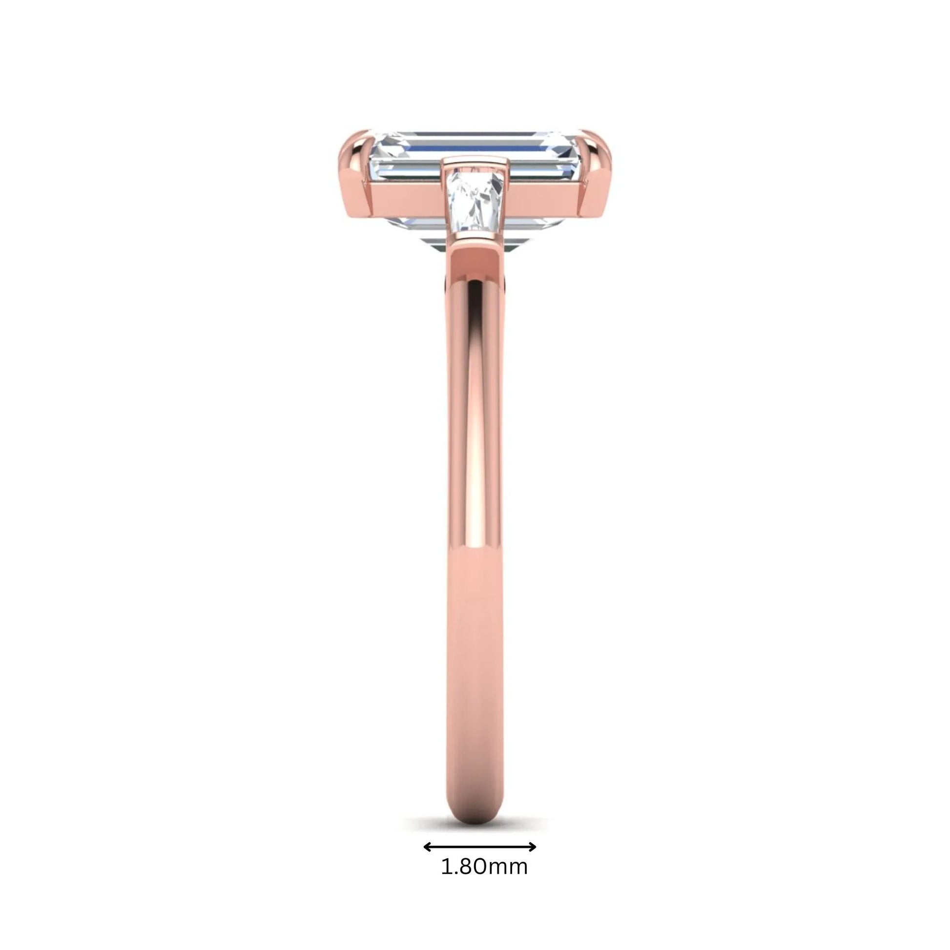 IGI Certified 2.20 carat emerald cut lab grown diamond engagement ring with tapered baguette side diamonds in rose gold.