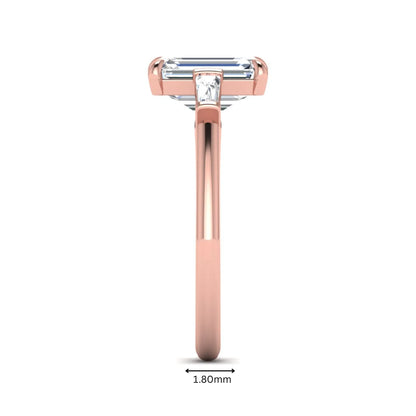 IGI Certified 2.20 carat emerald cut lab grown diamond engagement ring with tapered baguette side diamonds in rose gold.