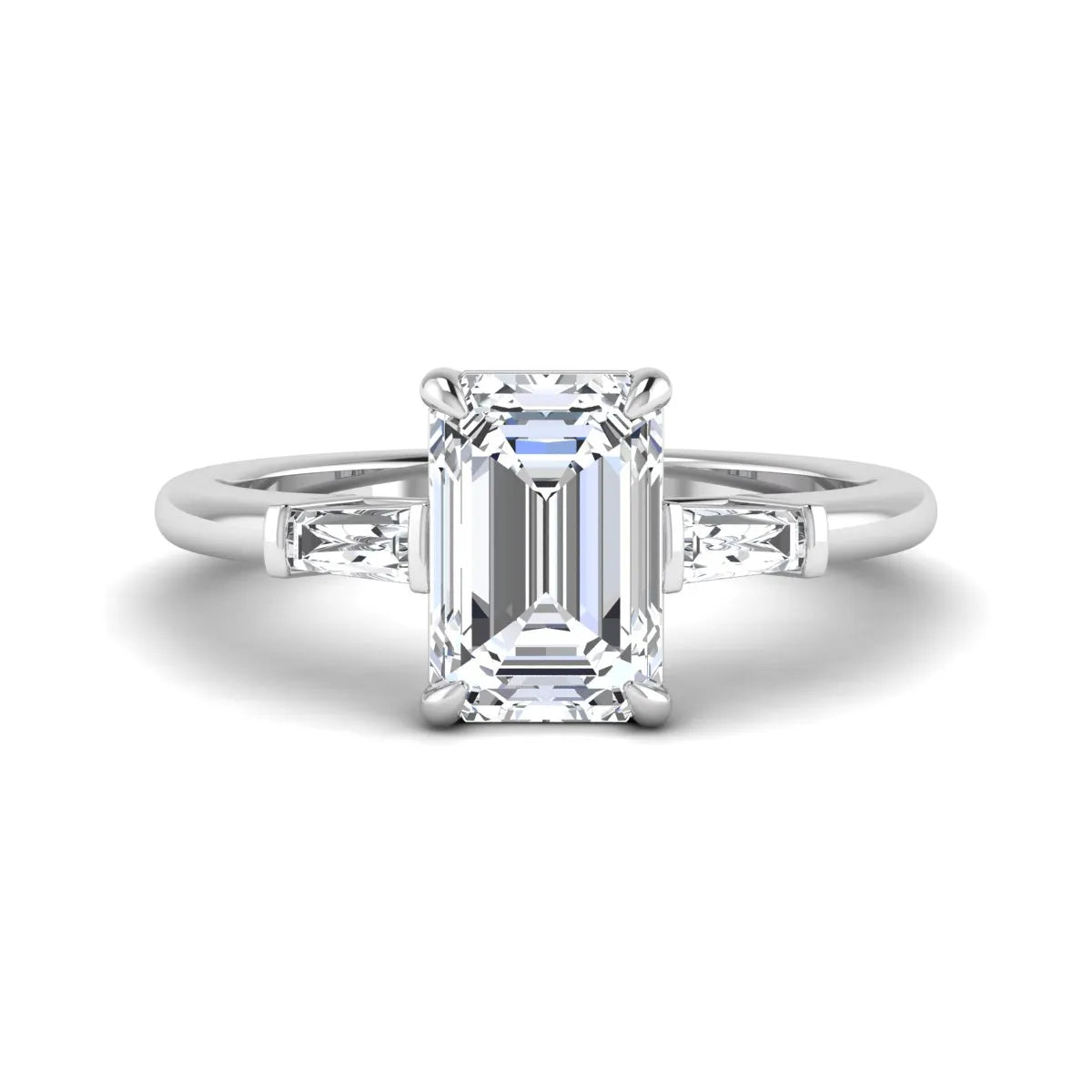 IGI Certified 2.20 carat emerald cut lab grown diamond engagement ring with tapered baguette side diamonds in white gold.