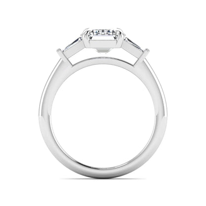 IGI Certified 2.20 carat emerald cut lab grown diamond engagement ring with tapered baguette side diamonds in white gold.