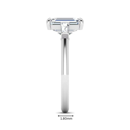 IGI Certified 2.20 carat emerald cut lab grown diamond engagement ring with tapered baguette side diamonds in white gold.