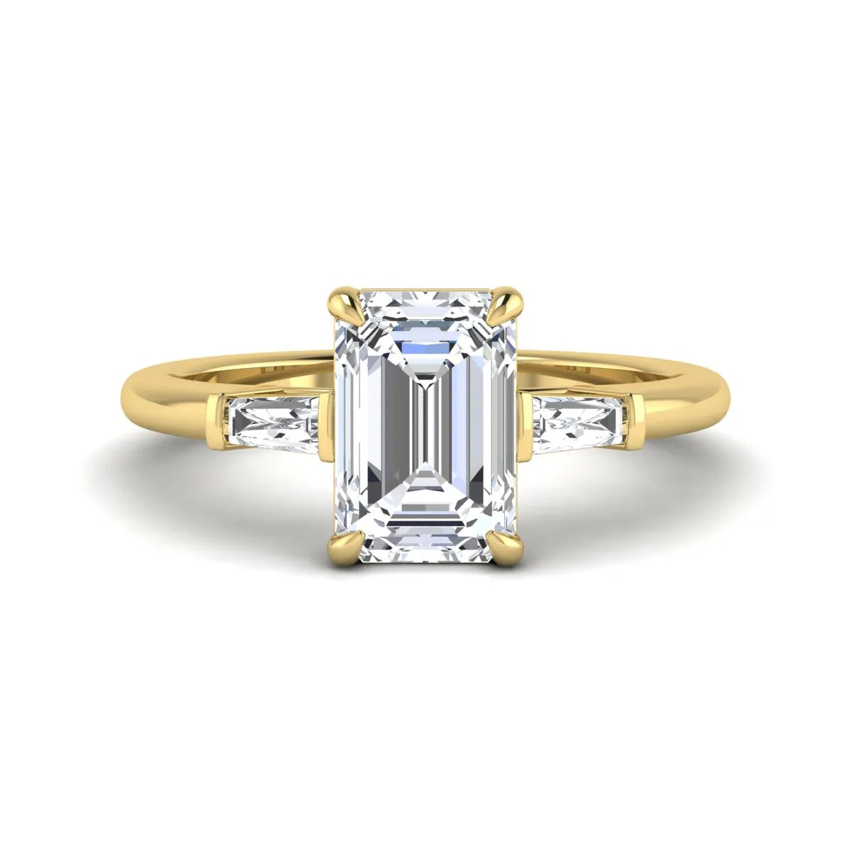 IGI Certified 2.20 carat emerald cut lab grown diamond engagement ring with tapered baguette side diamonds in yellow gold.