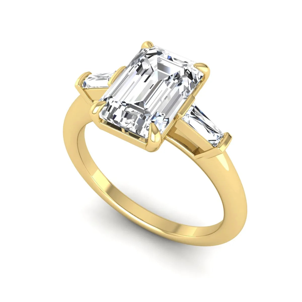 IGI Certified 2.20 carat emerald cut lab grown diamond engagement ring with tapered baguette side diamonds in yellow gold.