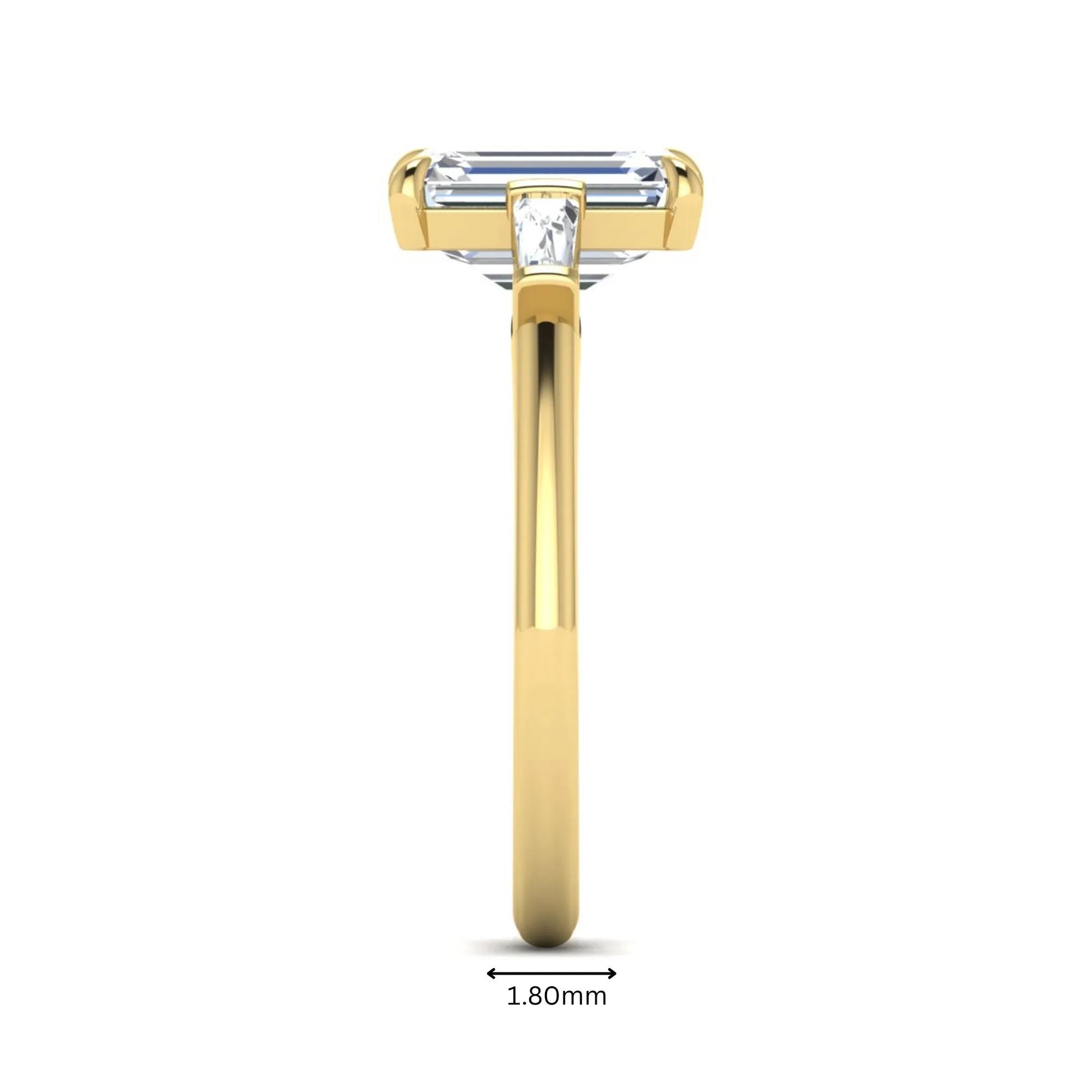 IGI Certified 2.20 carat emerald cut lab grown diamond engagement ring with tapered baguette side diamonds in yellow gold.