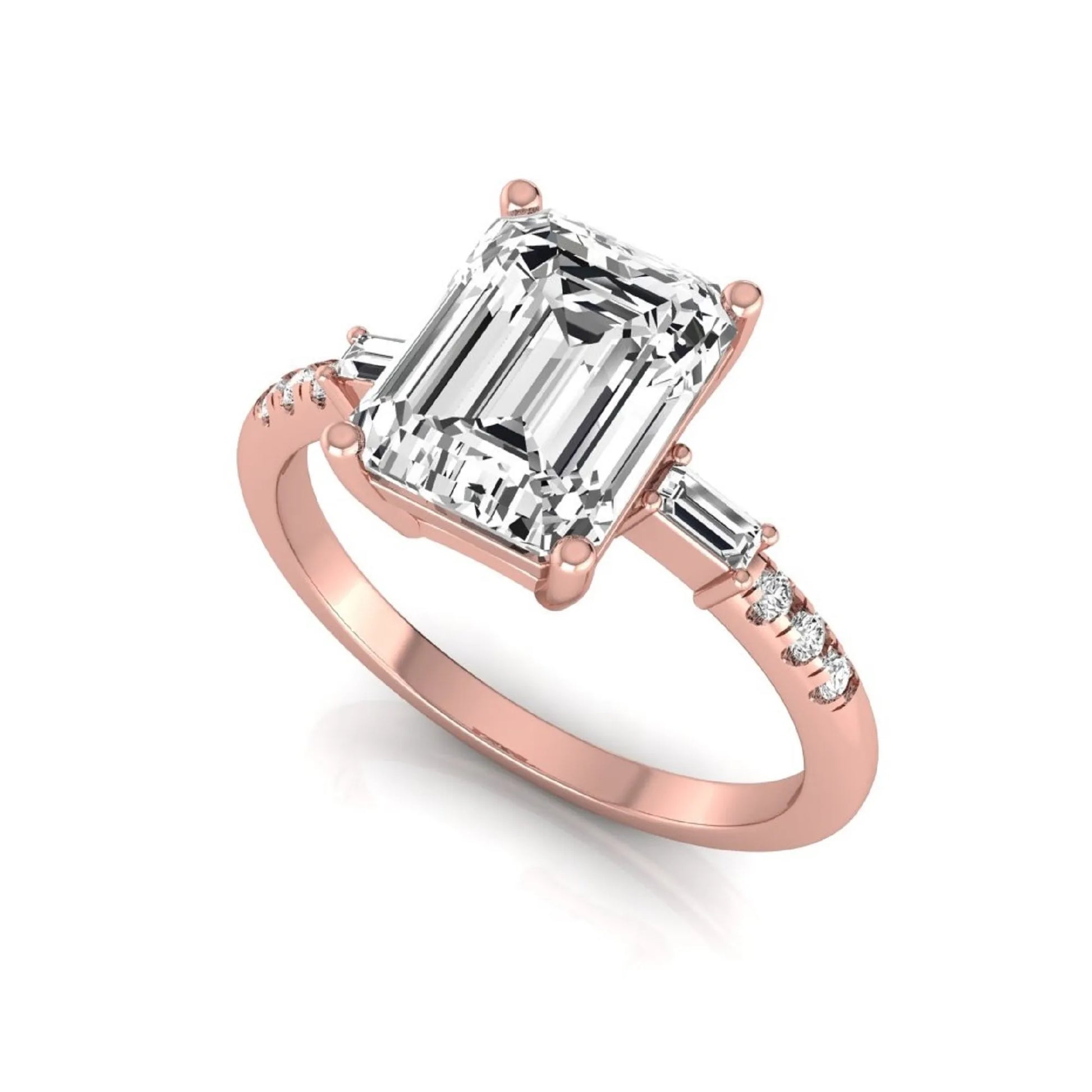 Emerald cut lab grown diamond engagement ring featuring an IGI certified center diamond with baguette and round side diamonds in a classic four-prong three-stone setting in rose gold