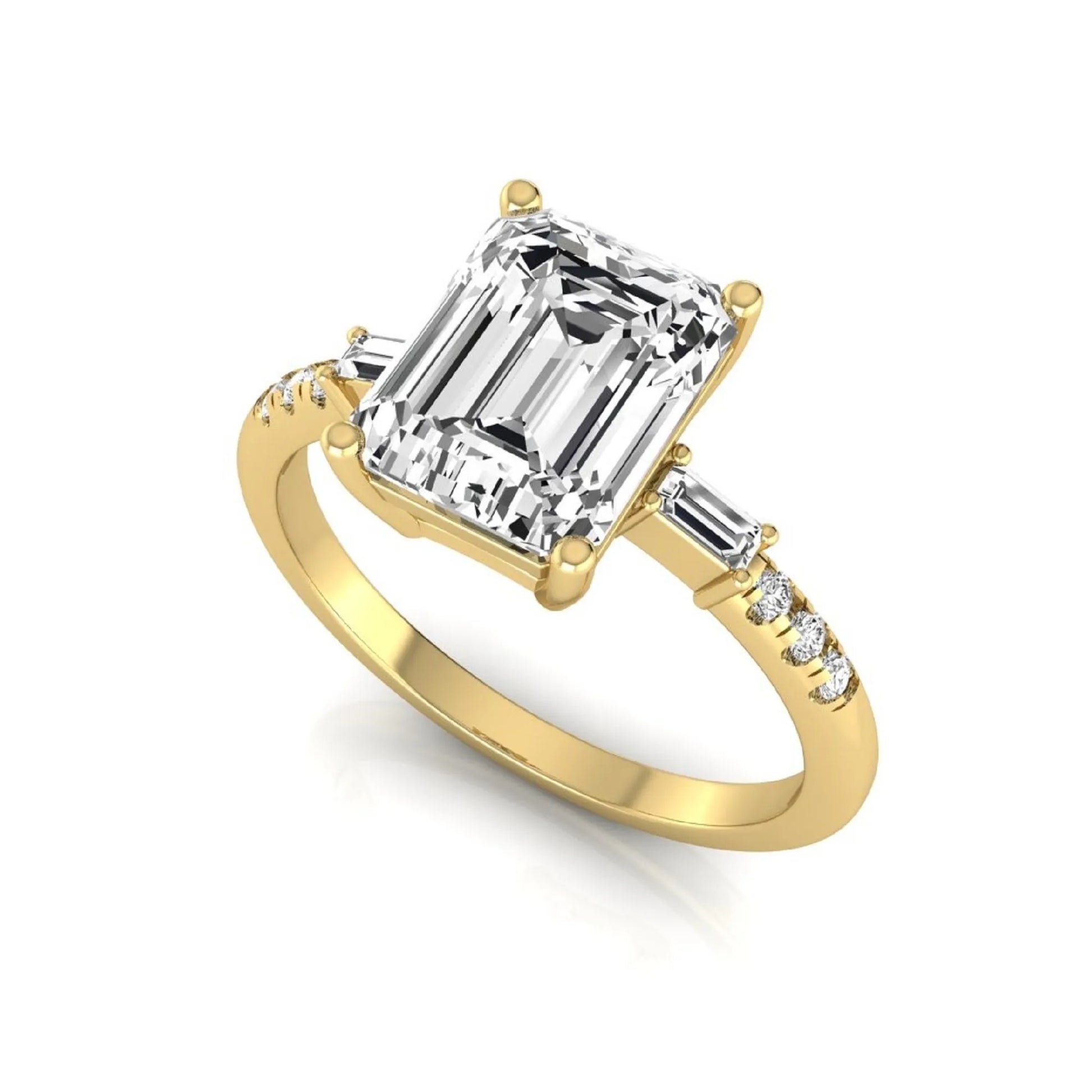 Emerald cut lab grown diamond engagement ring featuring an IGI certified center diamond with baguette and round side diamonds in a classic four-prong three-stone setting in yellow gold