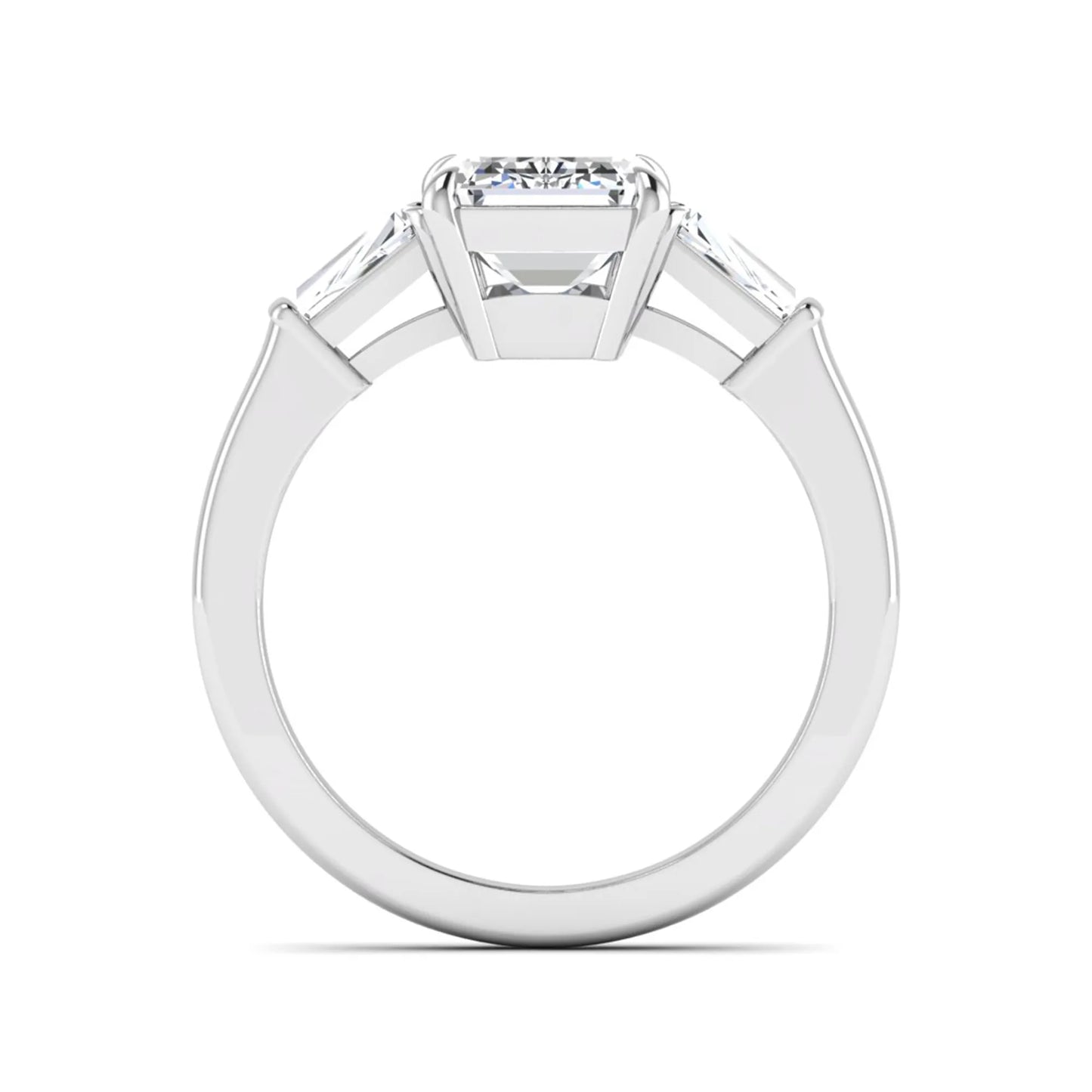 Emerald three stone prong set lab grown diamond engagement ring featuring a 3.00 carat emerald cut center diamond with tapered baguette side diamonds in white gold finish.