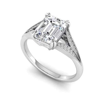 Emerald cut lab grown diamond engagement ring with round diamond split shank, milgrain detailing, and classic four prong setting in white gold