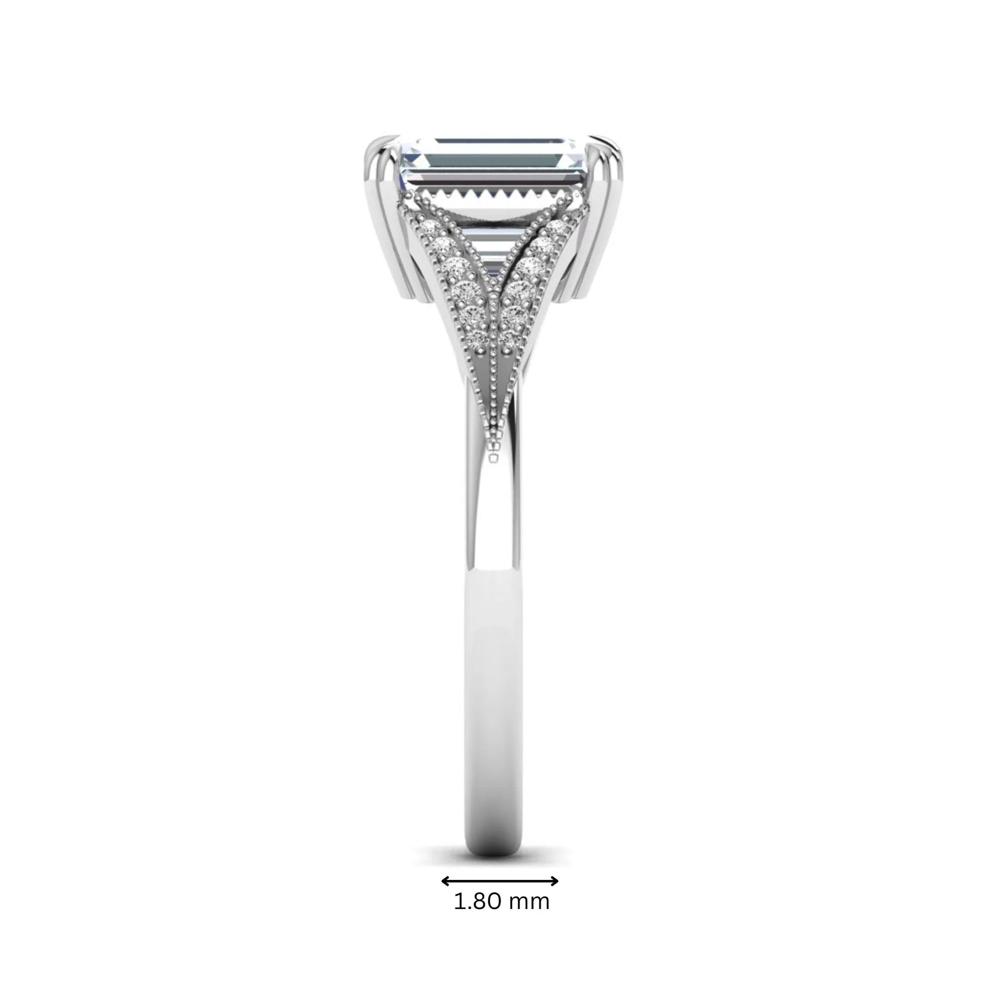 Emerald cut lab grown diamond engagement ring with round diamond split shank, milgrain detailing, and classic four prong setting in white gold