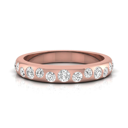 Flush set graduated round cut lab grown diamond band ring in polished rose gold with a modern half eternity design.