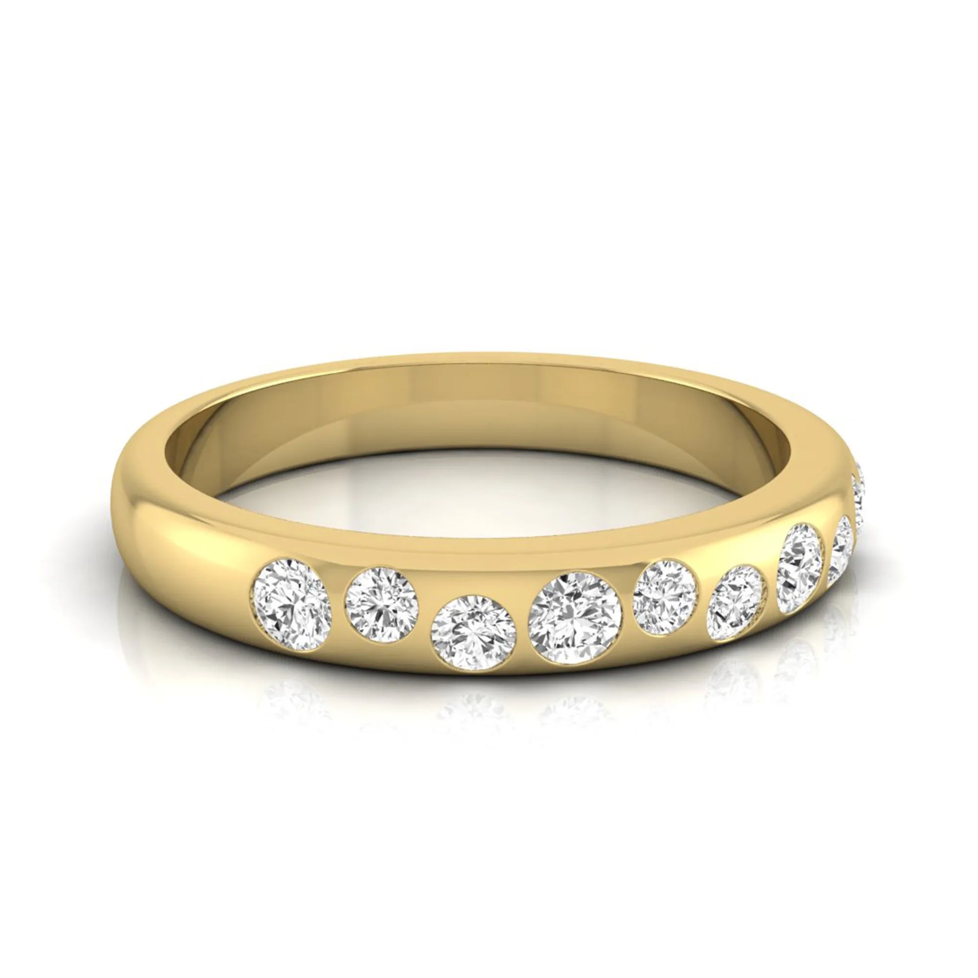 Flush set graduated round cut lab grown diamond band ring in polished yellow gold with a modern half eternity design.