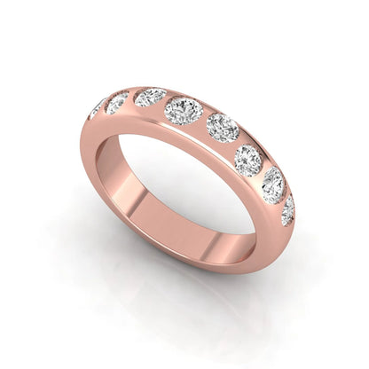 Flush set round cut lab grown diamond wedding band in polished rose gold with a modern comfort-fit design.