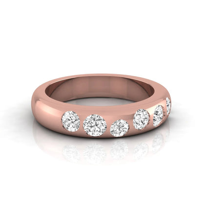 Flush set round cut lab grown diamond wedding band in polished rose gold with a modern comfort-fit design.