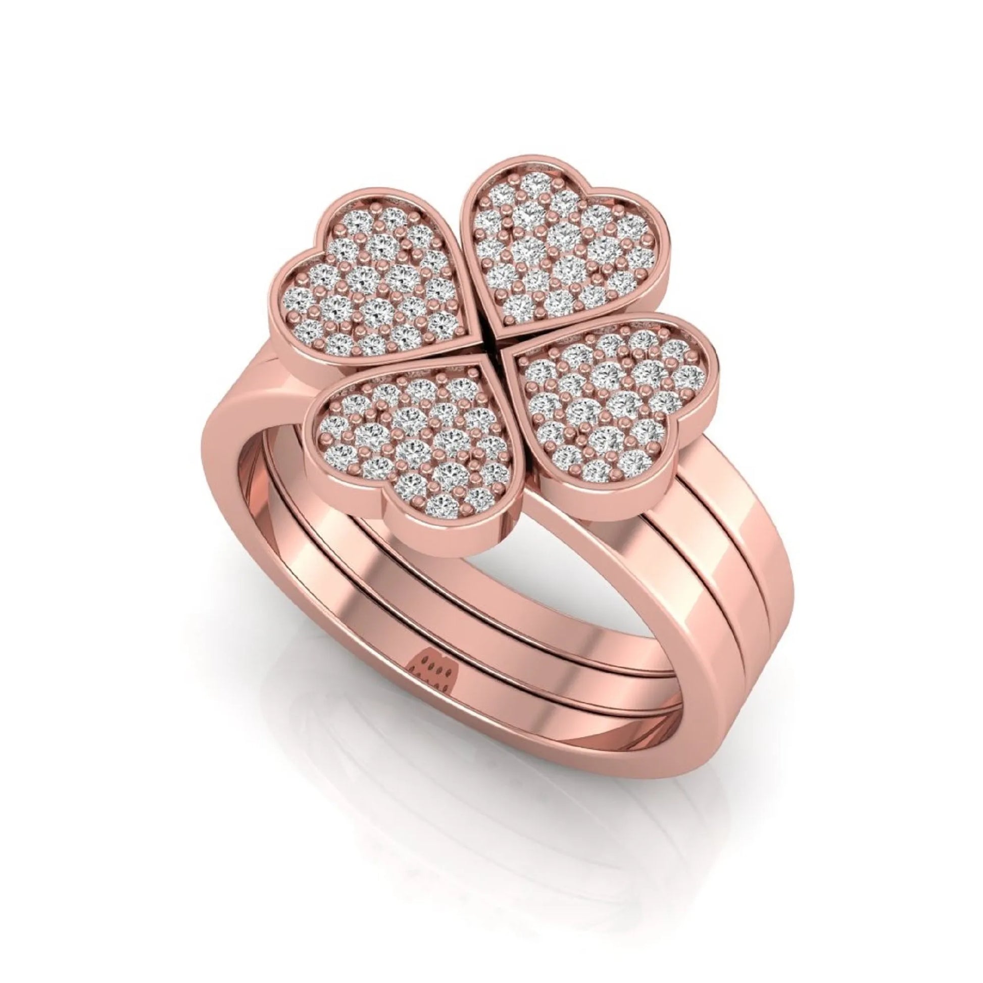 Three-ring lab grown diamond set featuring a four-heart clover motif with pavé round diamonds on polished rose gold style bands.