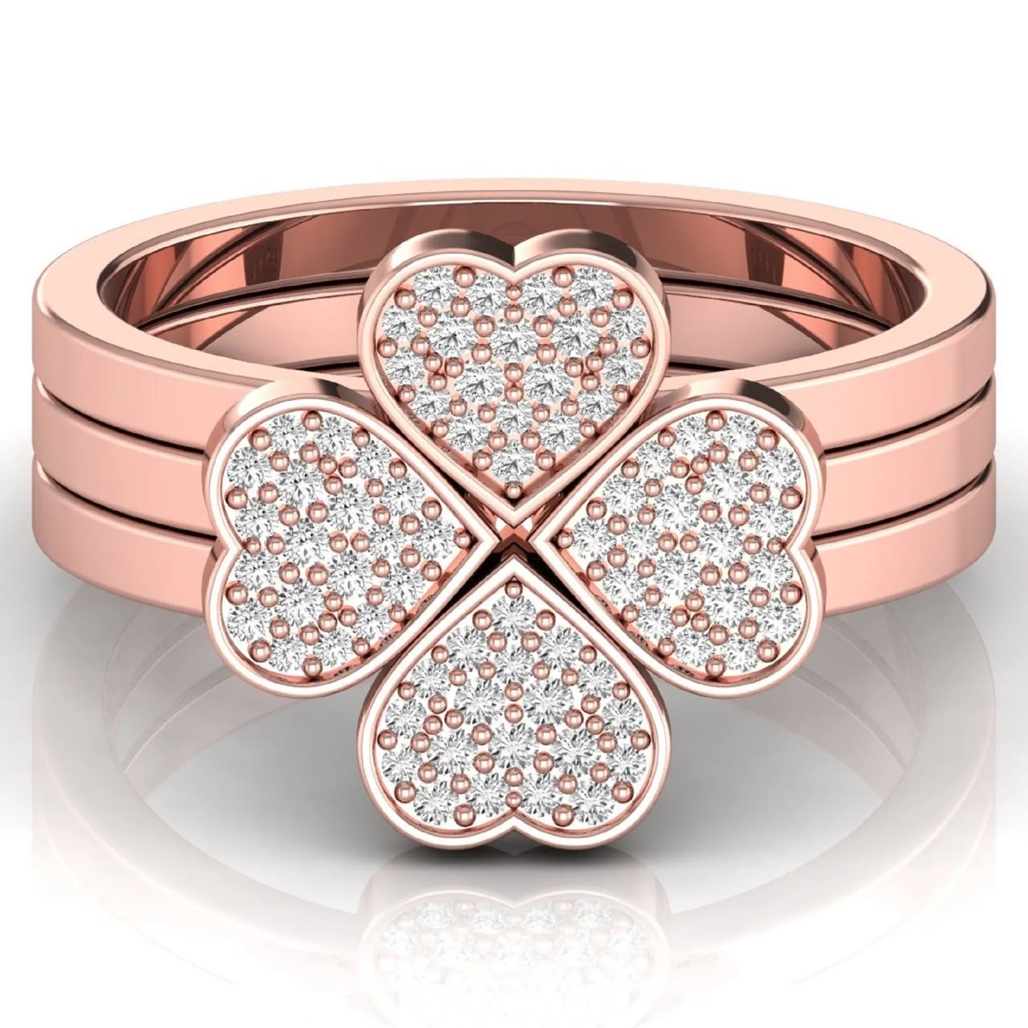 Three-ring lab grown diamond set featuring a four-heart clover motif with pavé round diamonds on polished rose gold style bands.