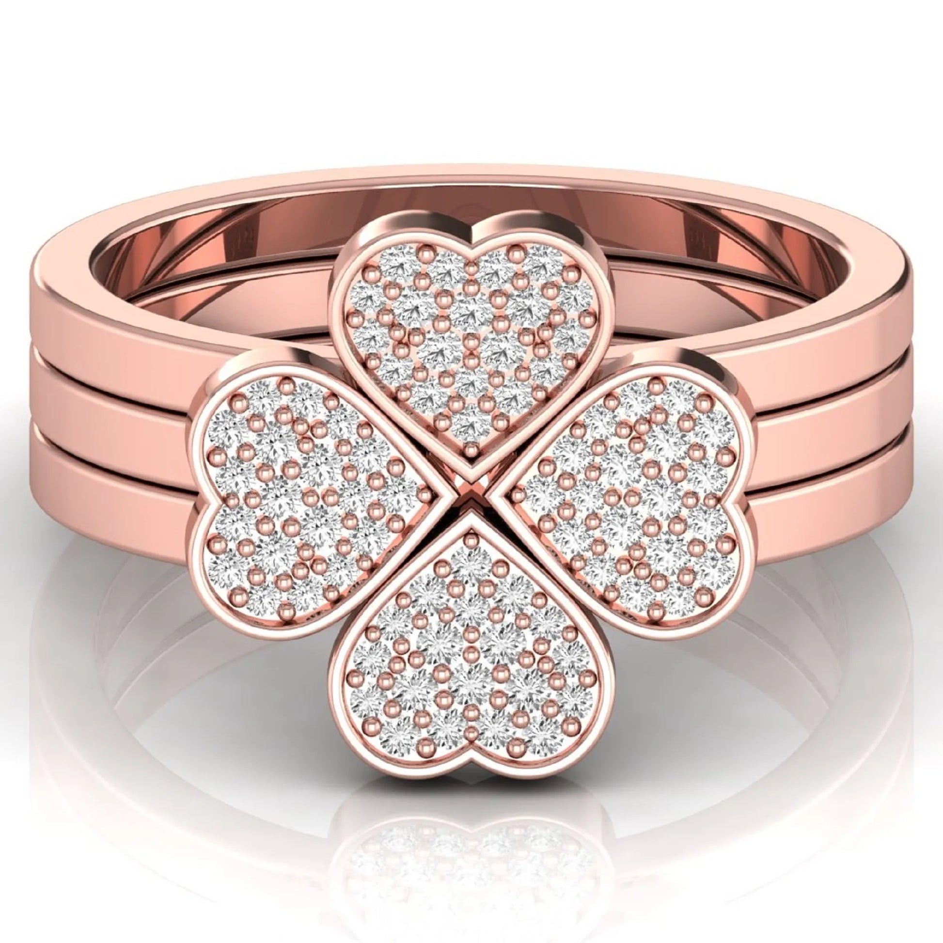 Three-ring lab grown diamond set featuring a four-heart clover motif with pavé round diamonds on polished rose gold style bands.