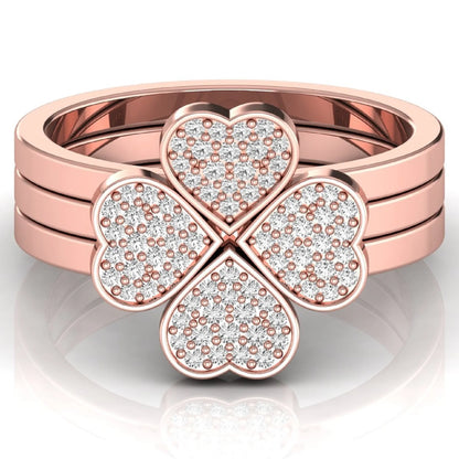 Three-ring lab grown diamond set featuring a four-heart clover motif with pavé round diamonds on polished rose gold style bands.