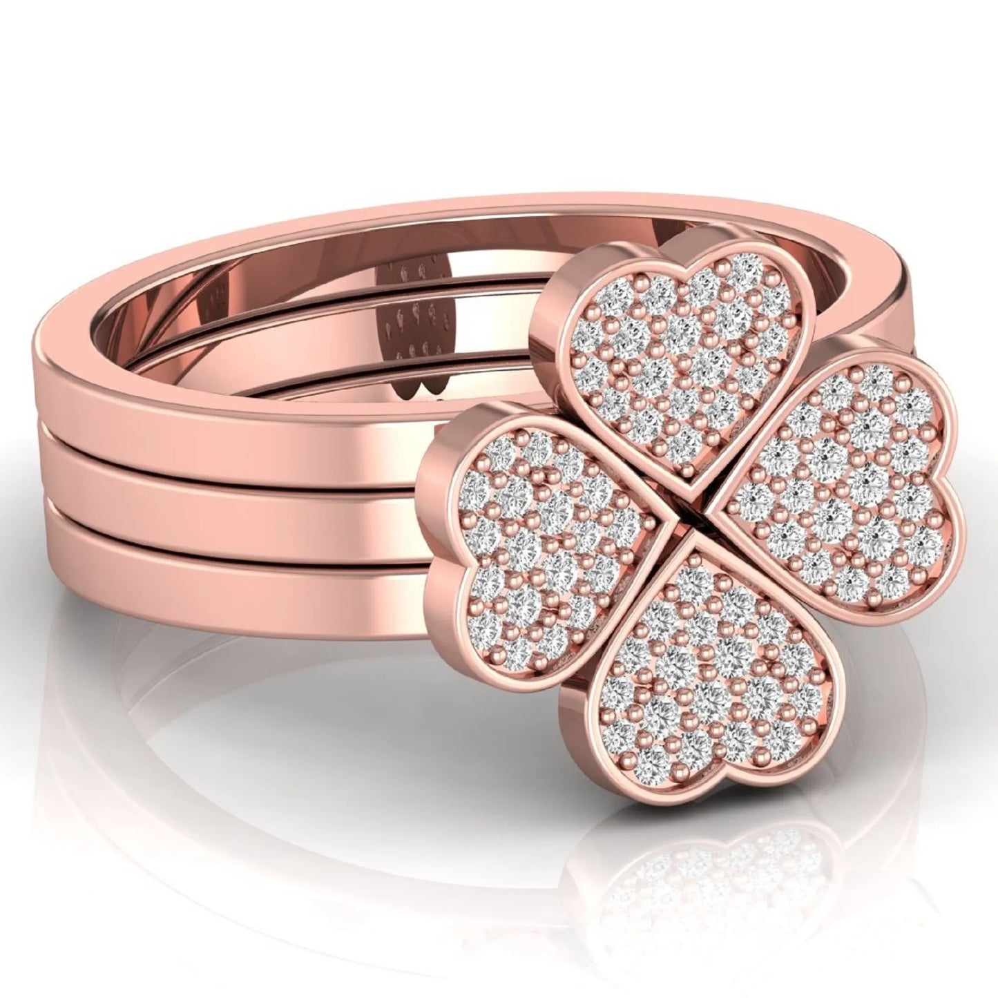 Three-ring lab grown diamond set featuring a four-heart clover motif with pavé round diamonds on polished rose gold style bands.