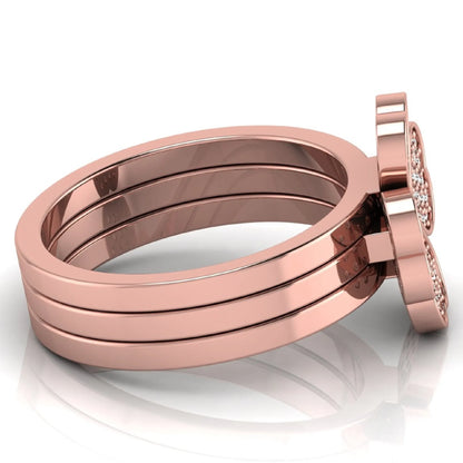 Three-ring lab grown diamond set featuring a four-heart clover motif with pavé round diamonds on polished rose gold style bands.