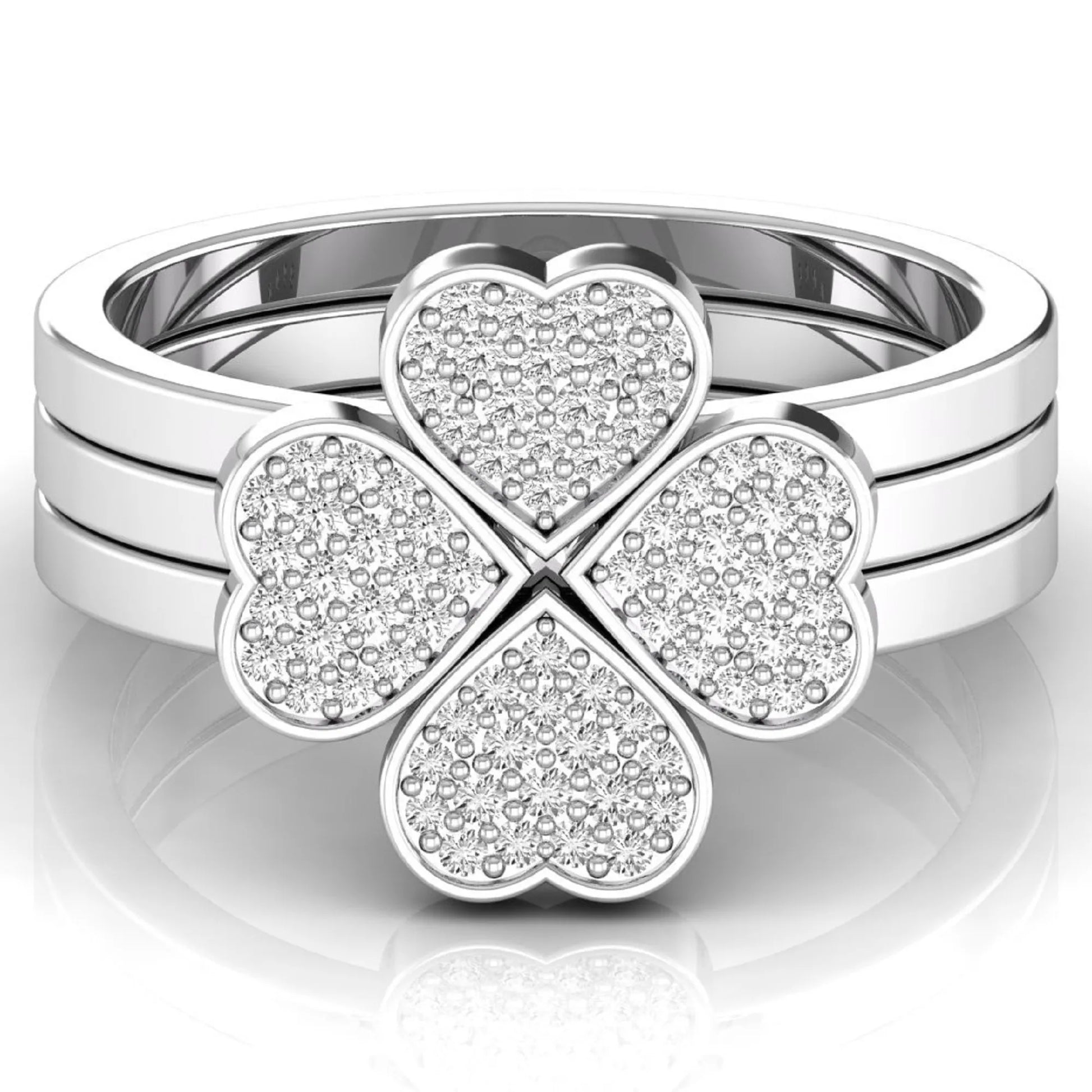 Three-ring lab grown diamond set featuring a four-heart clover motif with pavé round diamonds on polished white gold style bands.