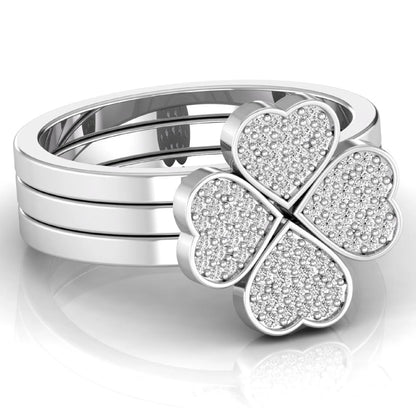 Three-ring lab grown diamond set featuring a four-heart clover motif with pavé round diamonds on polished white gold style bands.