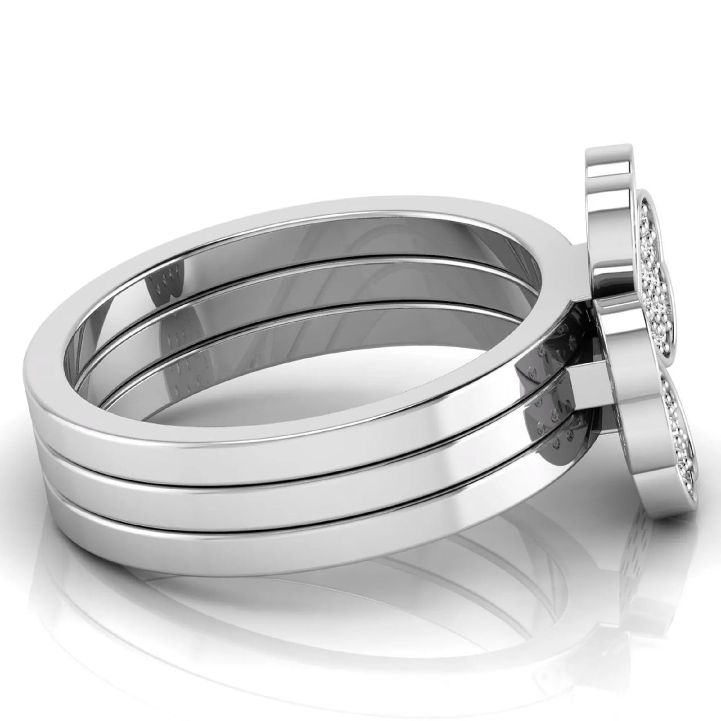 Three-ring lab grown diamond set featuring a four-heart clover motif with pavé round diamonds on polished white gold style bands.
