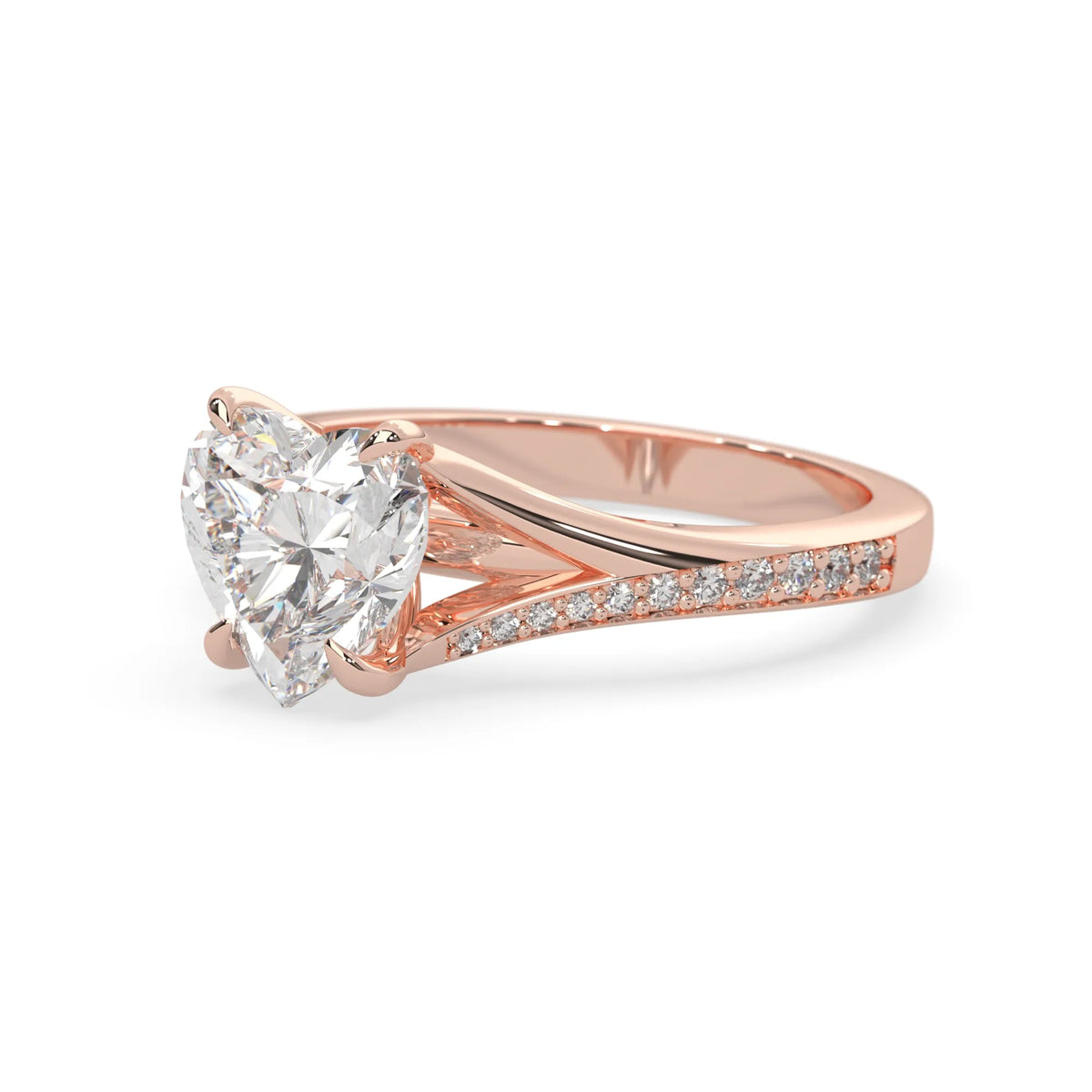 Rose gold ring with a large heart-shaped lab grown diamond and smaller diamonds on the band against a white background