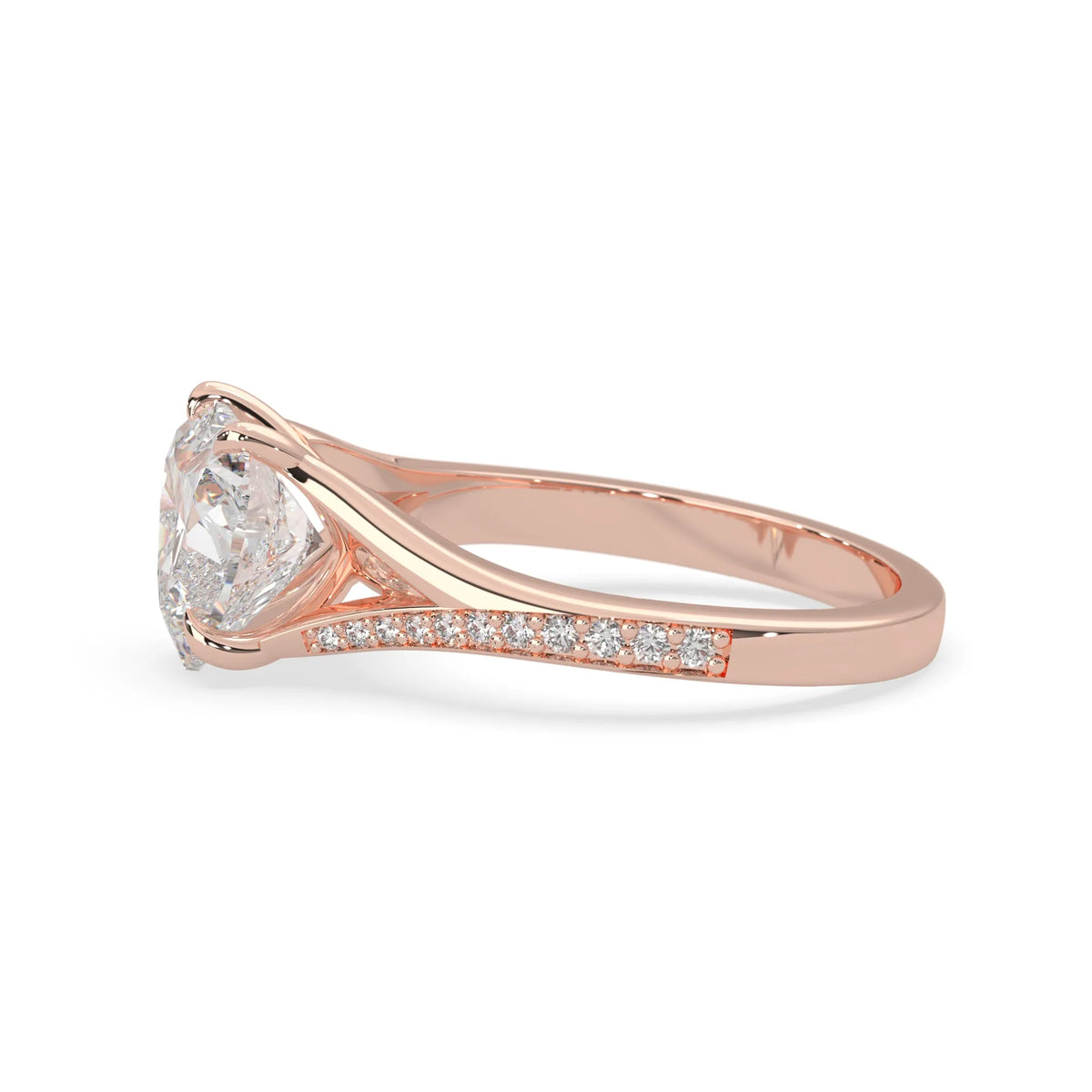 Rose gold ring with a lab grown diamond on a white background