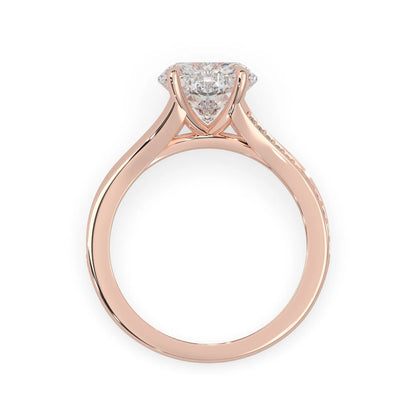 Rose gold ring with a lab grown diamond on a white background