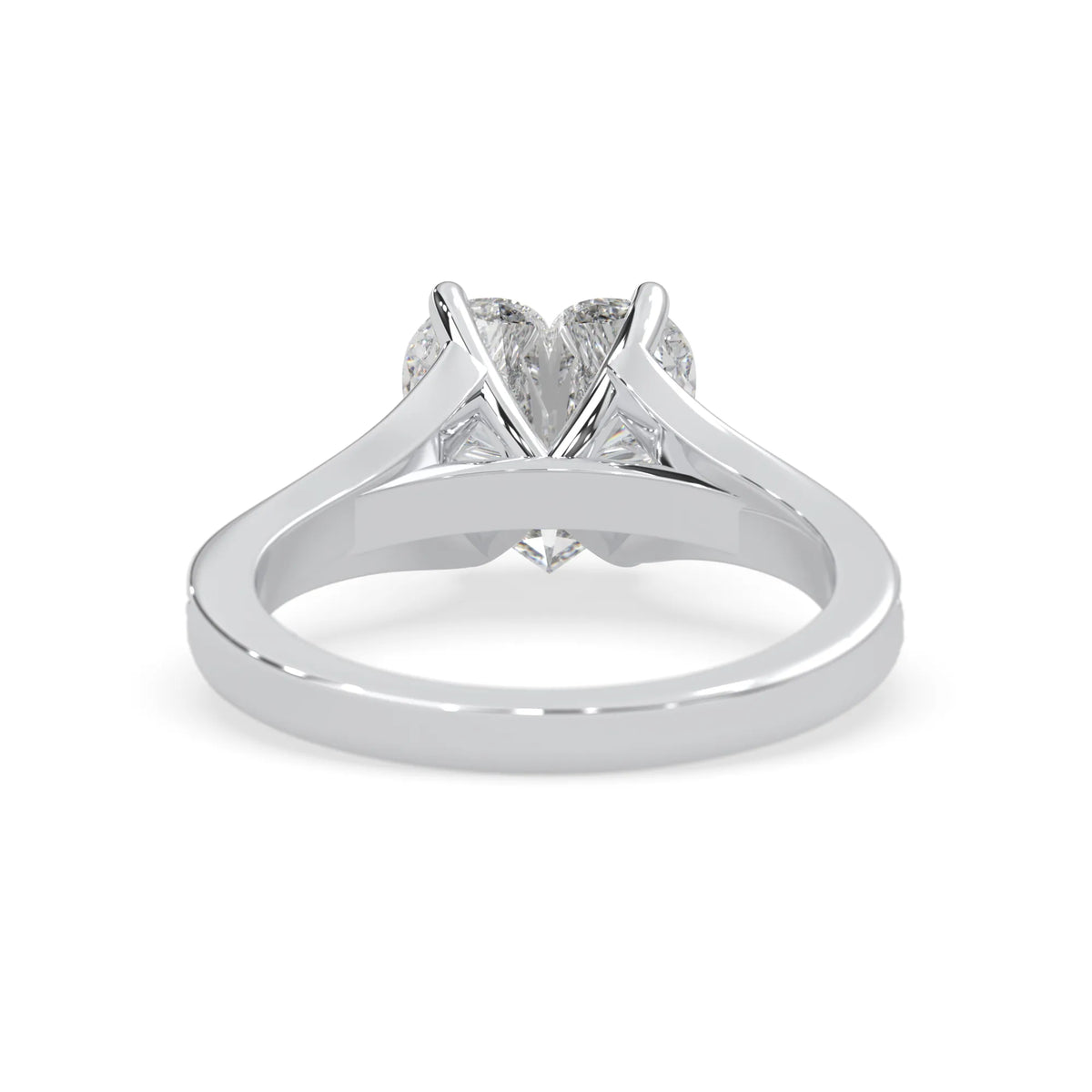 white gold lab grown Diamond ring with a heart-shaped center stone on a white background