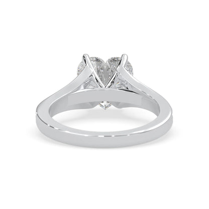 white gold lab grown Diamond ring with a heart-shaped center stone on a white background
