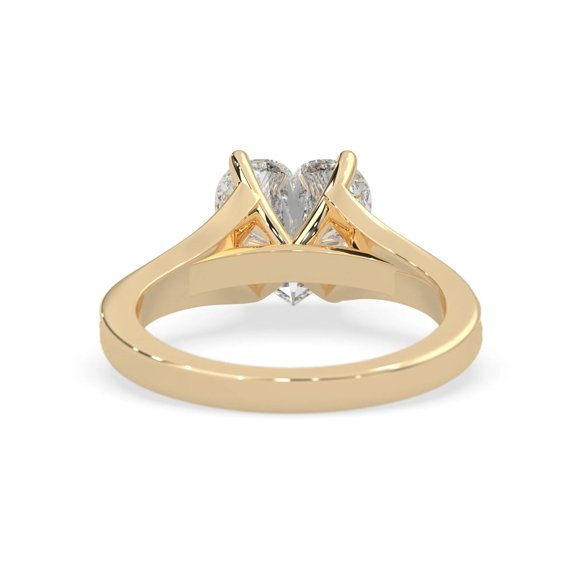 yellow Gold ring with a diamond on a white background