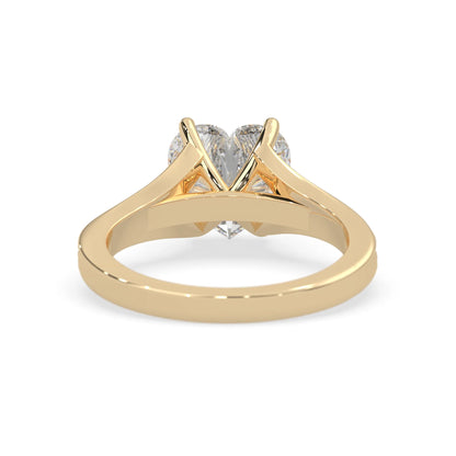 yellow Gold ring with a diamond on a white background