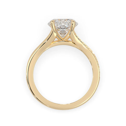 yellow Gold ring with a lab grown  diamond on a white background