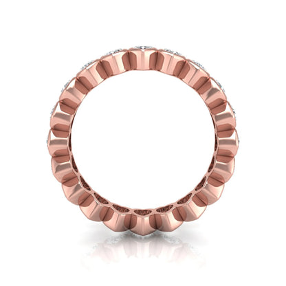 Heart cut lab grown diamond eternity band featuring 3.20 carats of heart-shaped diamonds in a shared-prong setting with a polished rose gold finish.