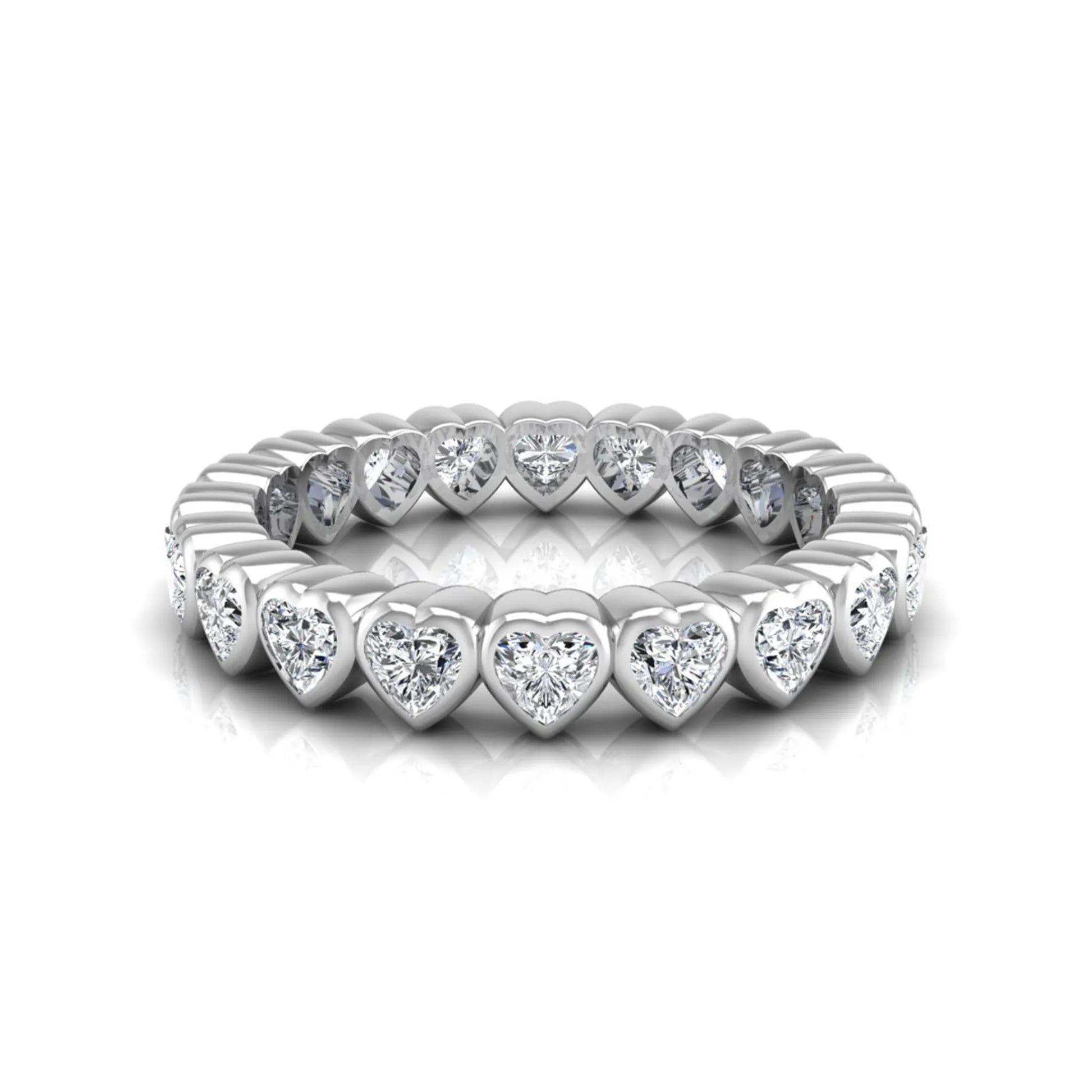 Heart cut lab grown diamond eternity band featuring 3.20 carats of heart-shaped diamonds in a shared-prong setting with a polished white gold finish.