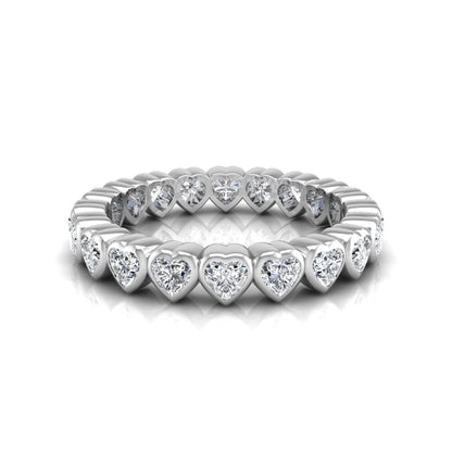 Heart cut lab grown diamond eternity band featuring 3.20 carats of heart-shaped diamonds in a shared-prong setting with a polished white gold finish.