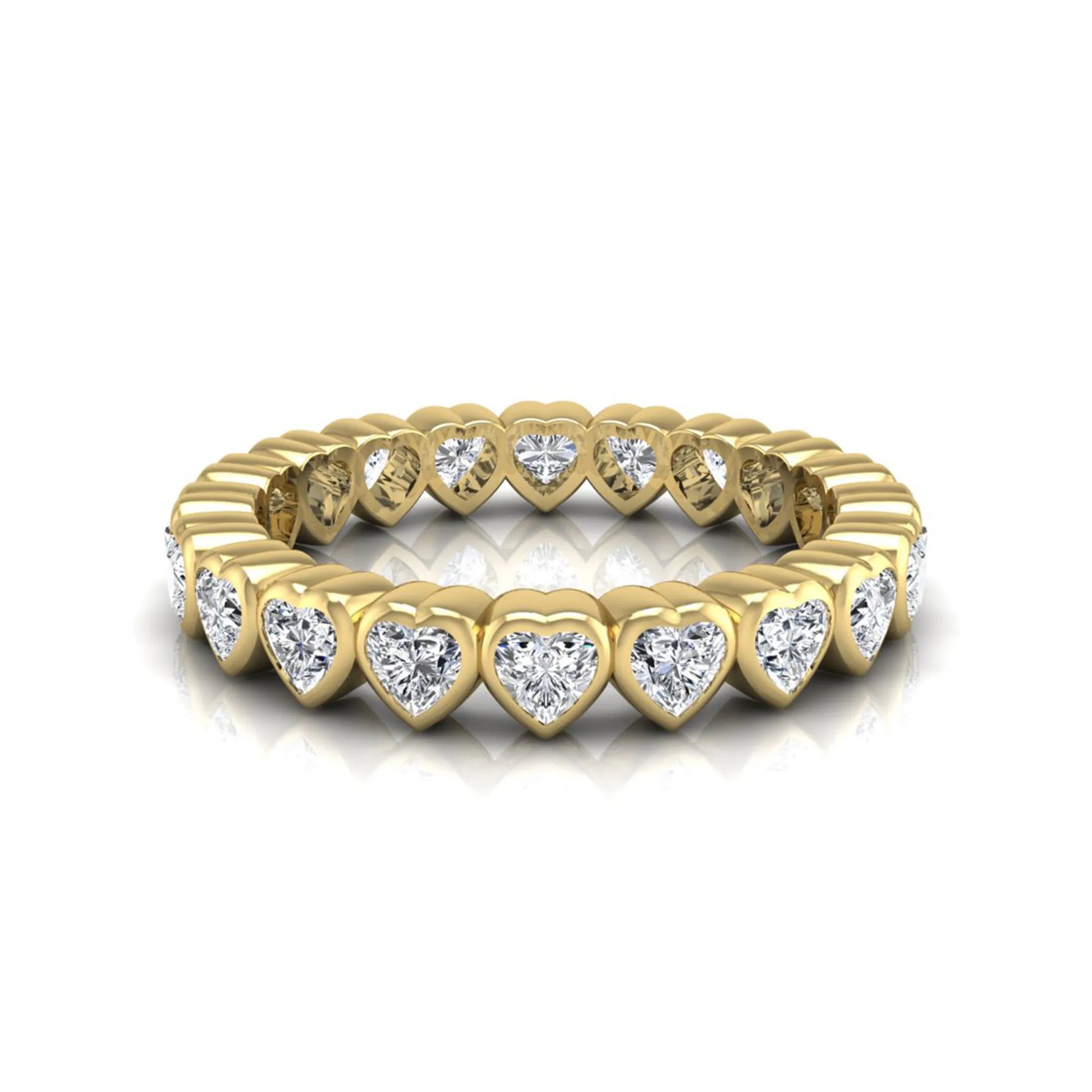 Heart cut lab grown diamond eternity band featuring 3.20 carats of heart-shaped diamonds in a shared-prong setting with a polished yellow gold finish.